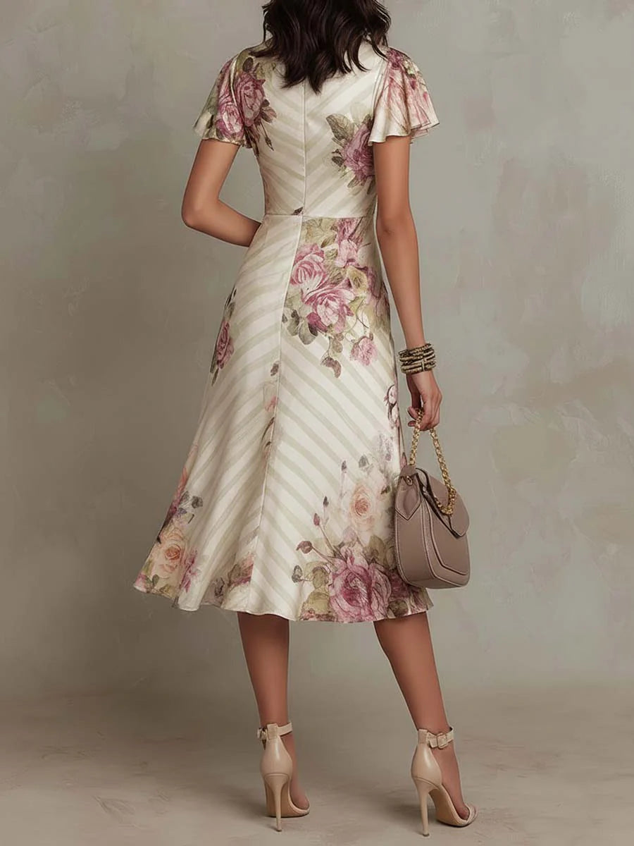 Joanna | Vestido midi satinado con flores de estilo vintage